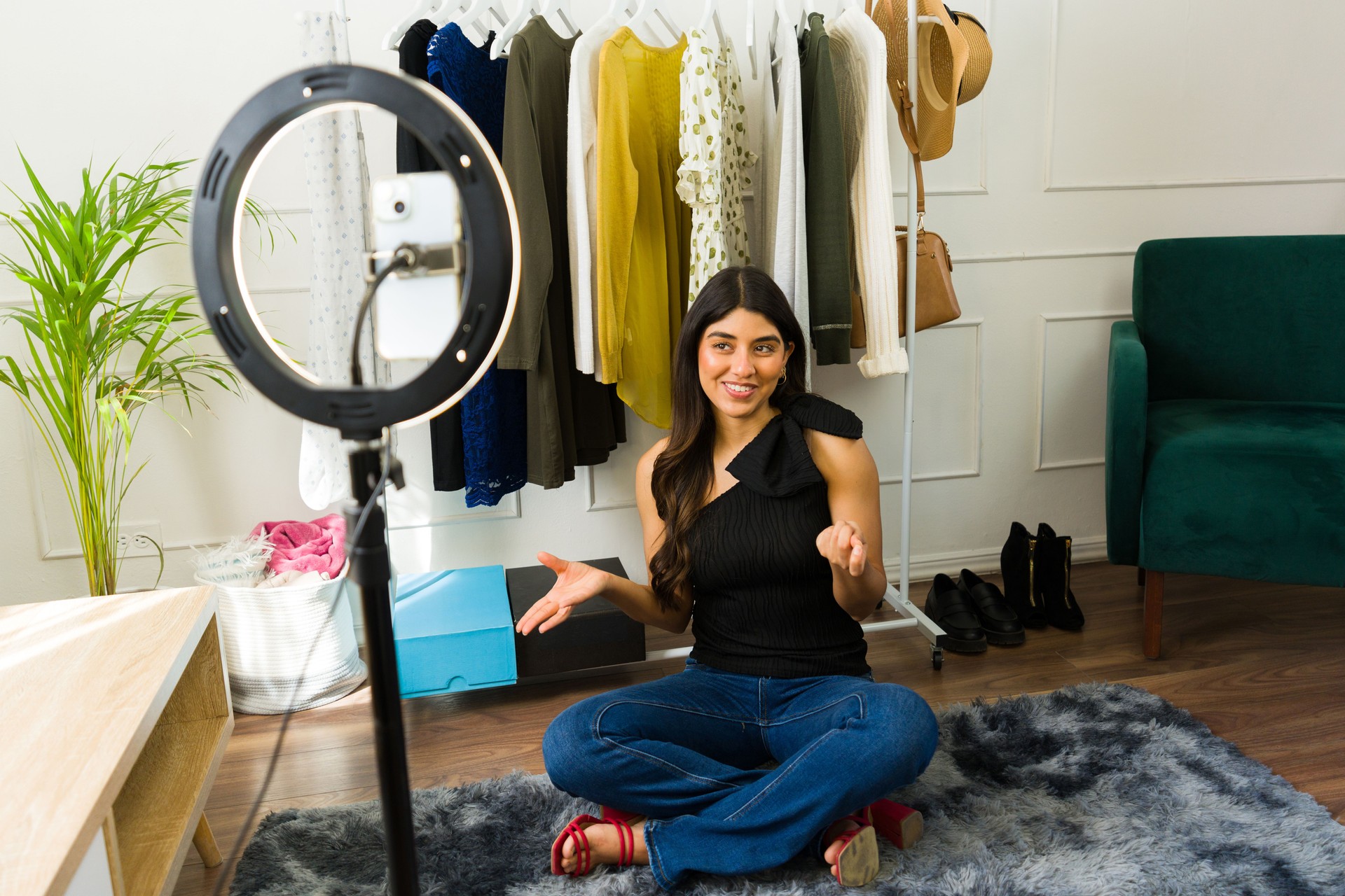 Fashion influencer creating content at home